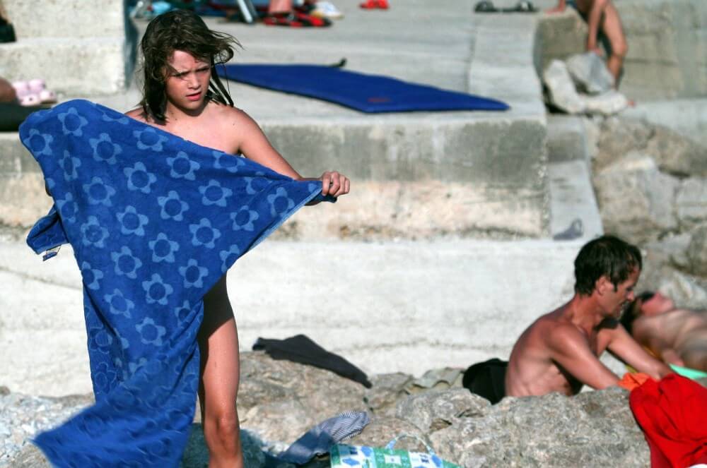 Nudist Rocky Family Angle - Peace and tranquility are goals for those who choose nudism and naturism