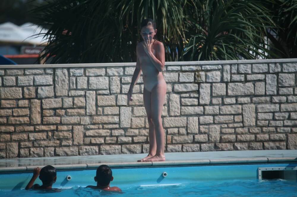Naturist Pool-Side Singles photos - Values trust and friendliness among naked people