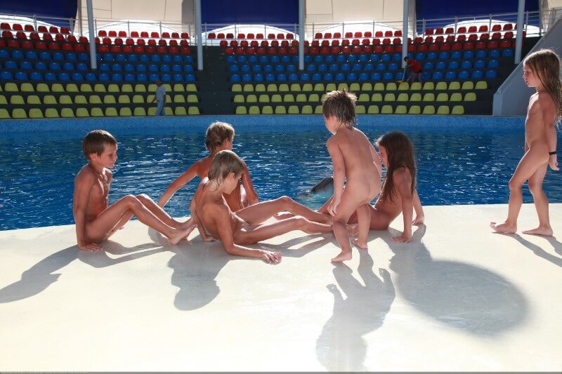 Swimming dolphins photo gallery - Interaction with Nature Through Naturism