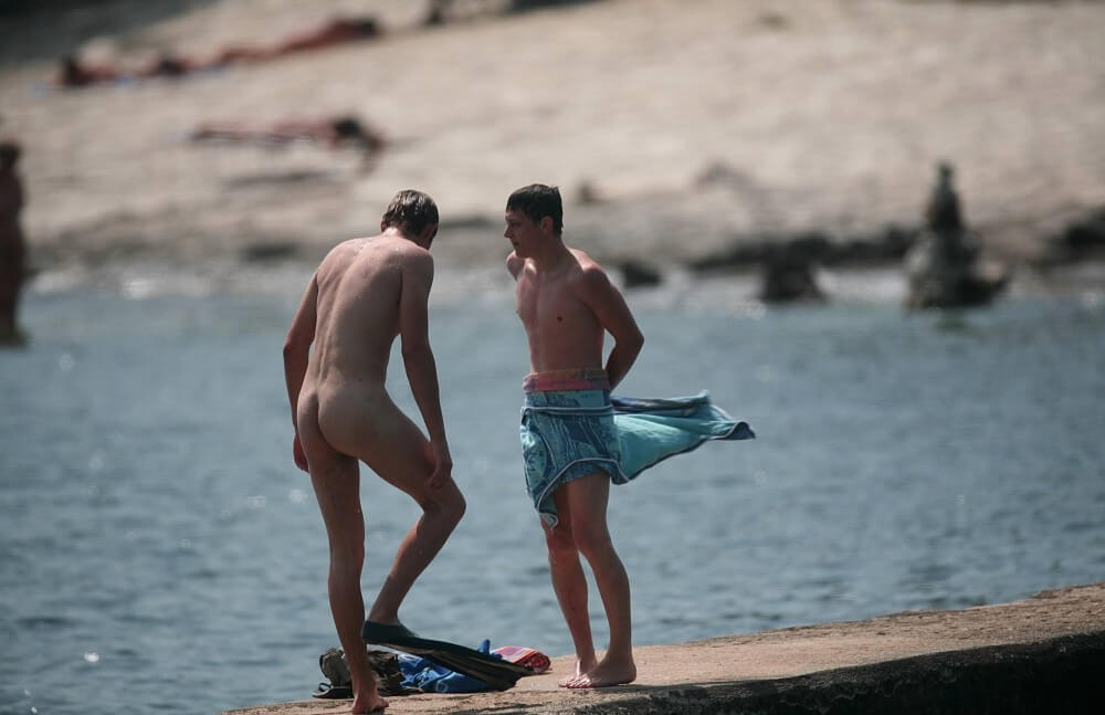 Nudists Boys - Water Prep On The Ledge - Naturists live easily and freely