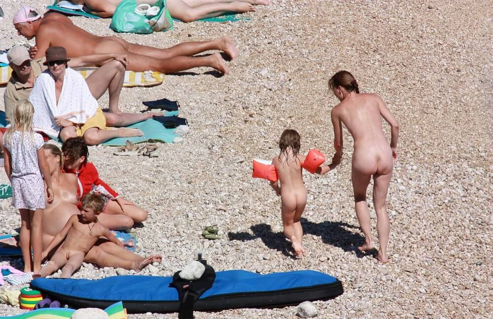 Orange Floaty Safety First Naturist pics - Ordinary people as naturists