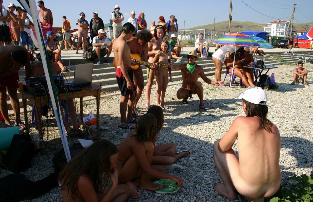 Nude Party By The Steps pics - A defining feature of naturism is the absence of clothing
